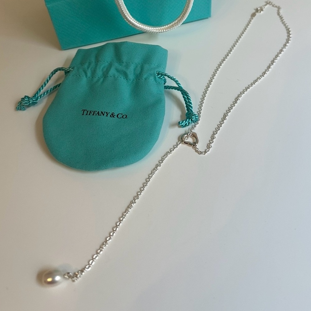Tiffany & Co. Elsa Peretti Open Heart Lariat Silver Necklace w/ Pearl.